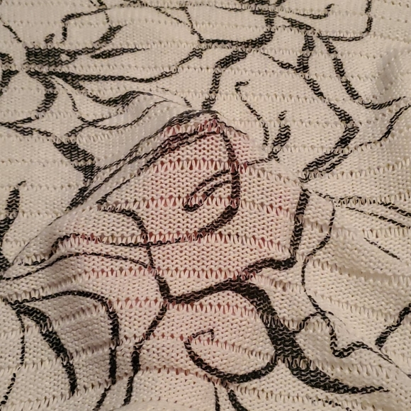 White sweater with Black flower design. - Picture 4 of 4